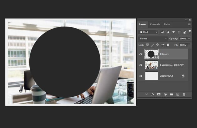 How to crop a single layer in Photoshop: create a circle shape.